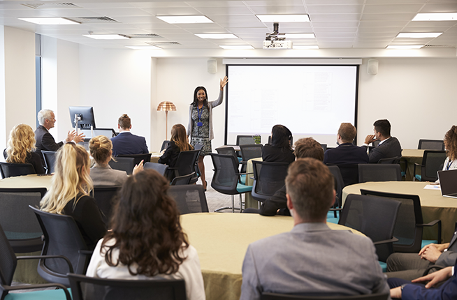 Employees at a corporate meeting.