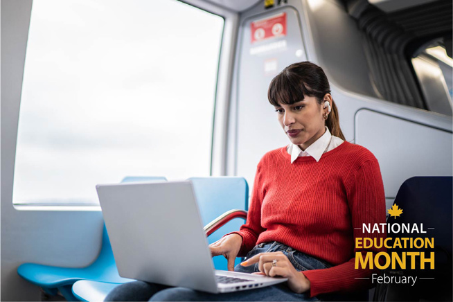 Woman using laptop on a bus.